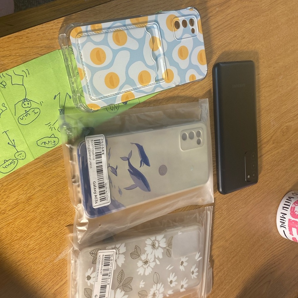 I’m selling a Samsung A03s with 3 phone cases as well as a charger